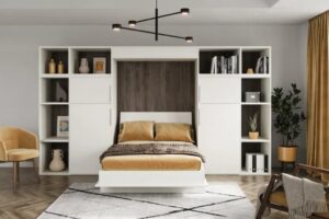 Cómo decorar un salón con una cama abatible